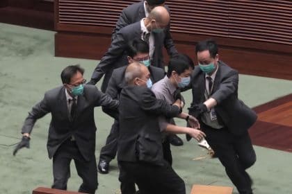 Lawmakers Ejected in Hong Kong Debate on Chinese Anthem Bill