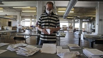 Cost, Hassle of Stamps Questioned as Mail-In Voting Surges