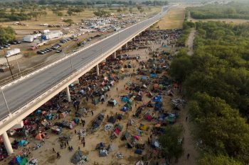Officials: Many Migrants From Border Camp Staying in US