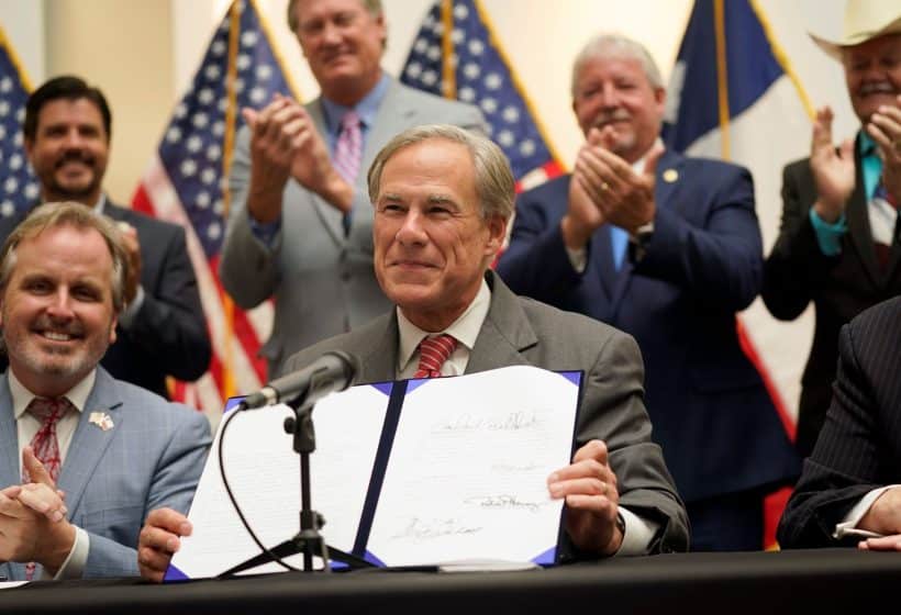 Democrats Sue As Texas Governor Signs Controversial Election Bill Into Law